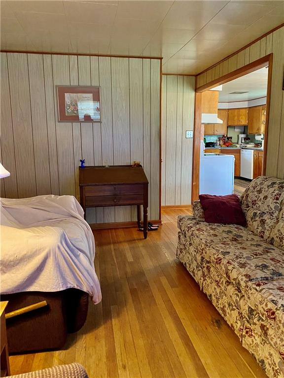 636 Fallen Timbers Road Point Marion, PA 15474 - Photo 13 of 21 a bedroom with a bed and wooden floor