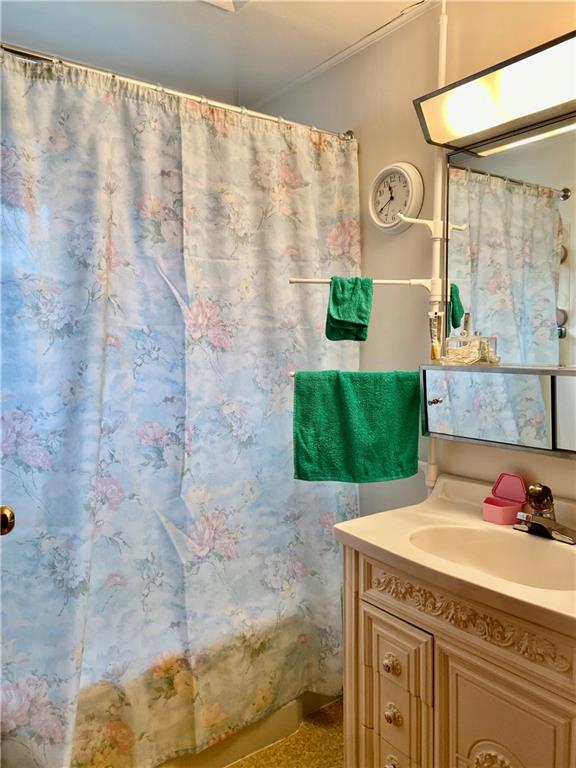 636 Fallen Timbers Road Point Marion, PA 15474 - Photo 15 of 21 a bathroom with a granite countertop sink and a mirror
