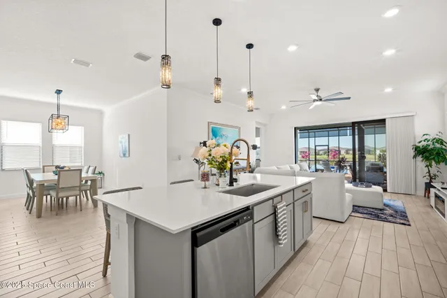 a kitchen with a table and chairs in it