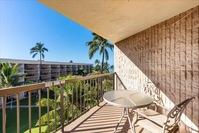 a kitchen with granite countertop a sink and a stove top oven
