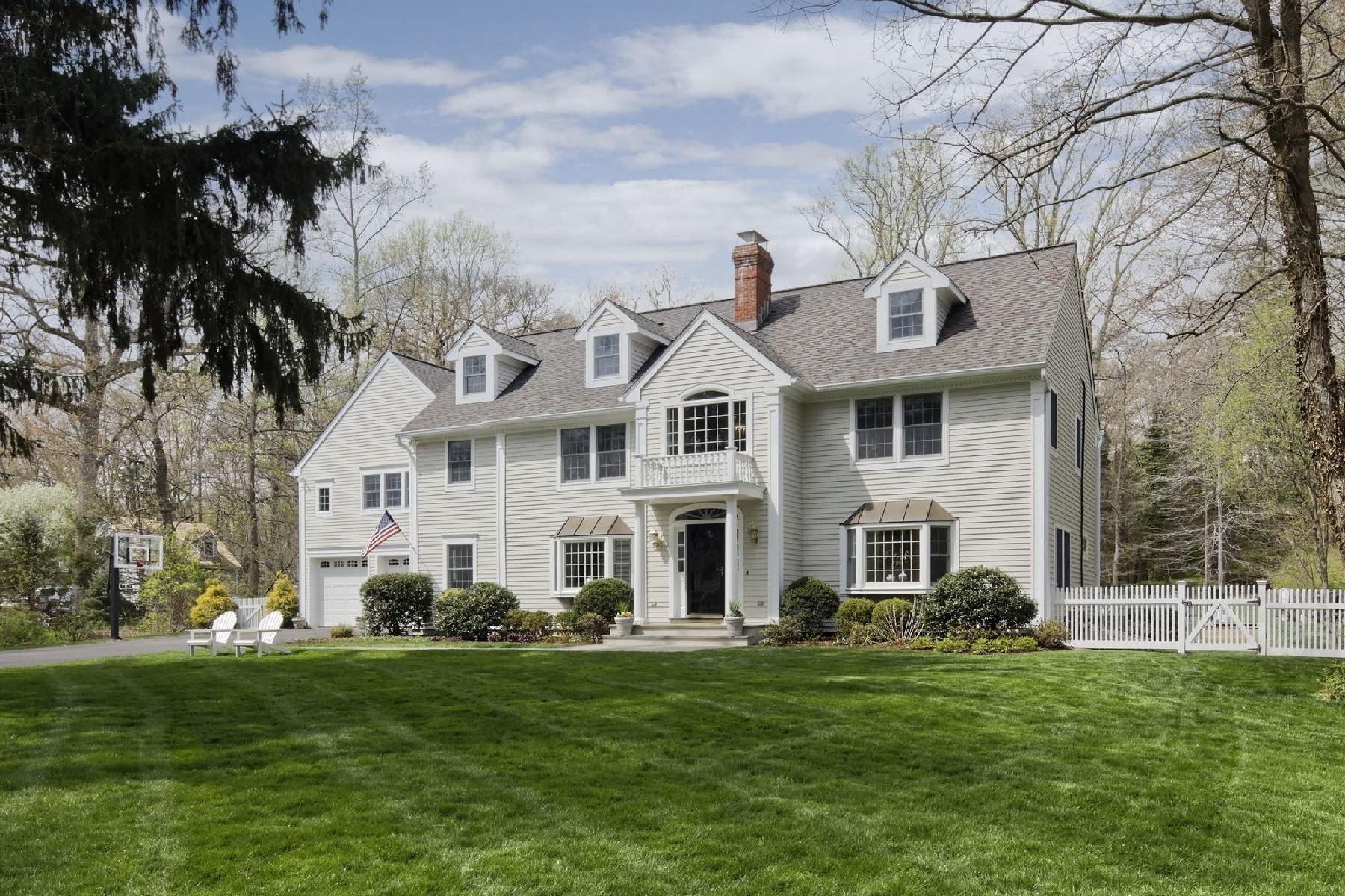 35 Hamilton Lane Darien, CT 06820 - Photo 2 of 25 a front view of a house with a garden