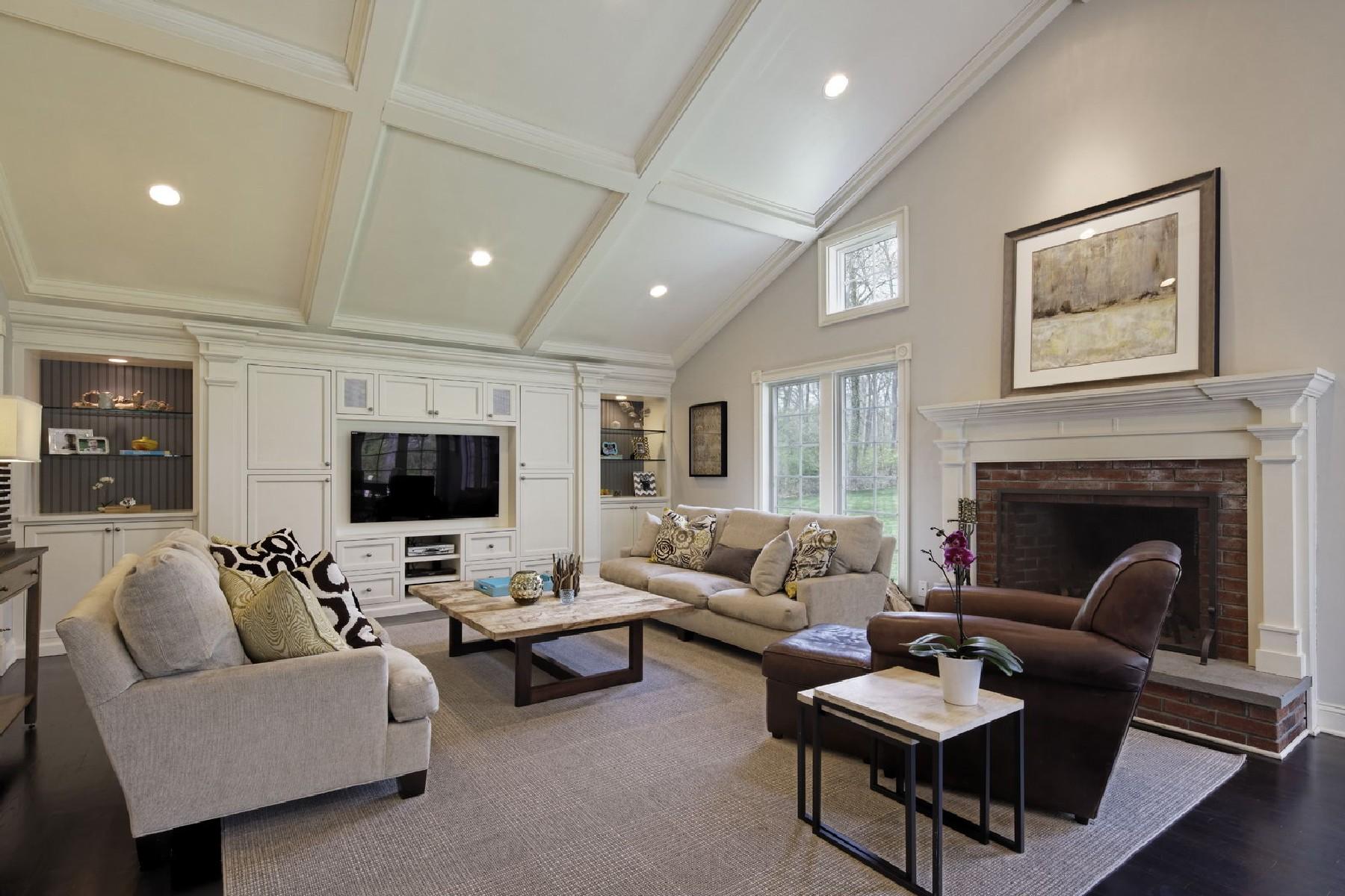 35 Hamilton Lane Darien, CT 06820 - Photo 9 of 25 a living room with furniture and a fireplace