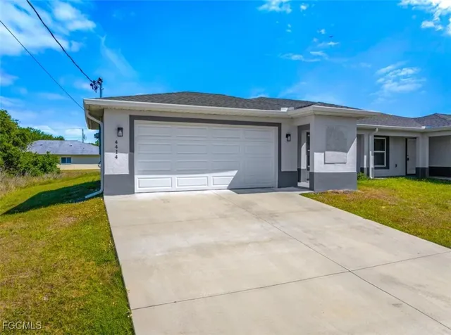 a house view with a garden space