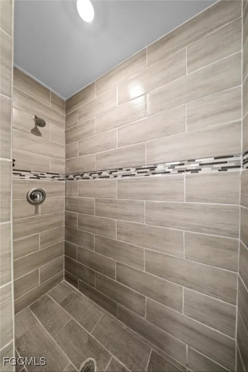 4414 28th Street Southwest Lehigh Acres, FL 33973 - Photo 16 of 29 a bathroom with a shower