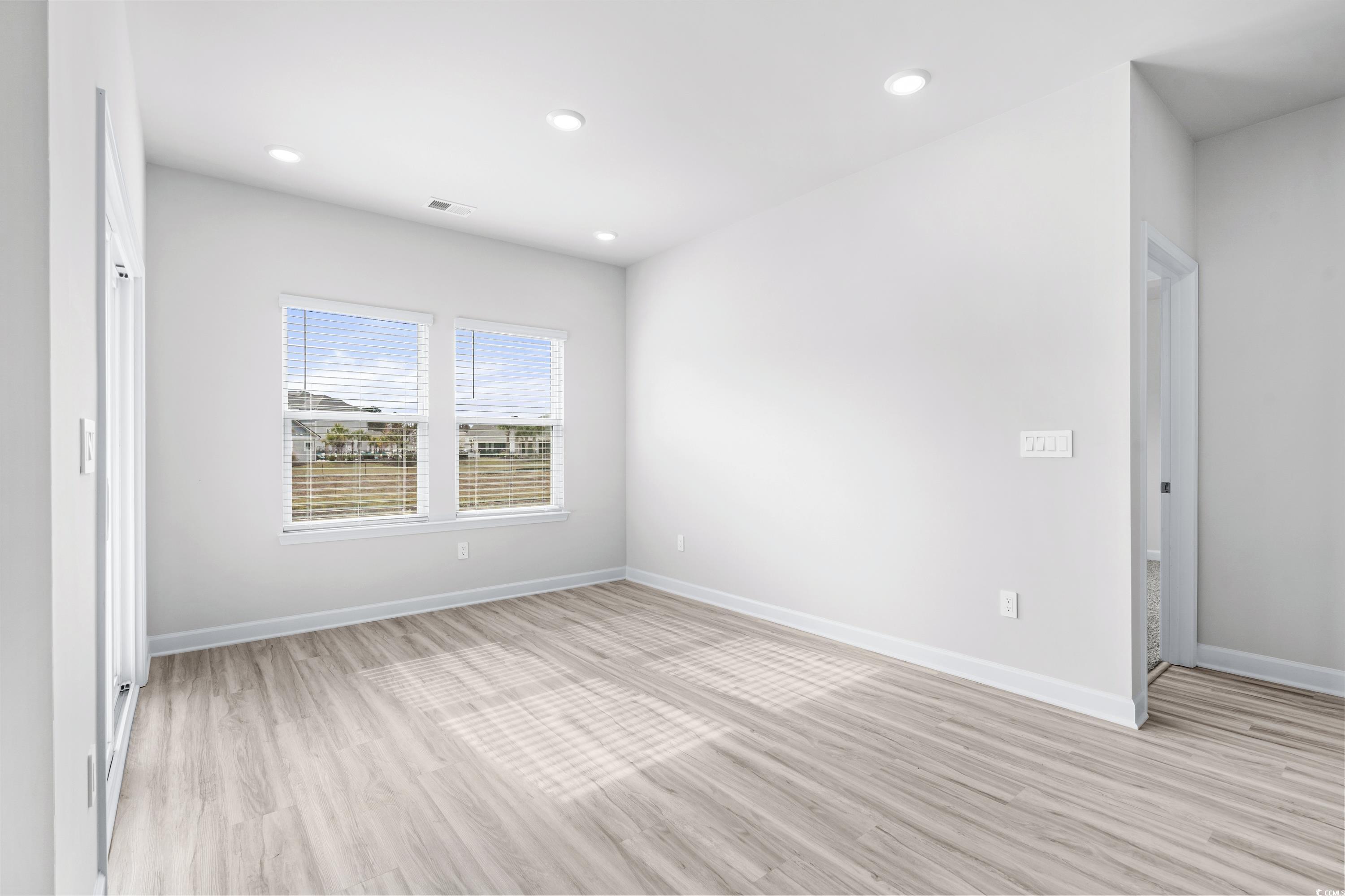 8616 Pinnacle Cv Way Longs, SC 29568 - Photo 12 of 32 Spare room with light hardwood / wood-style floori