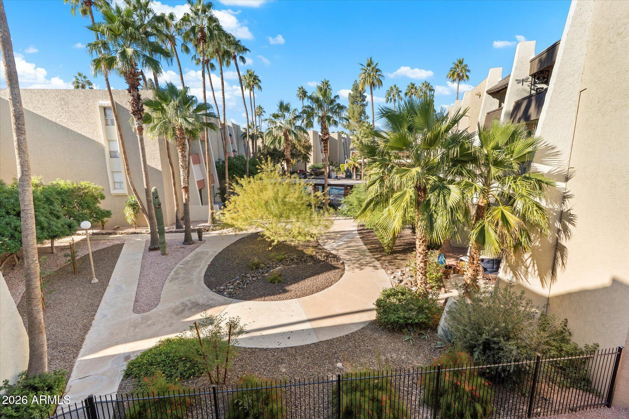 7625 East Camelback Road, Unit B325 Scottsdale, AZ 85251 - Photo 21 of 24 a view of outdoor space and yard