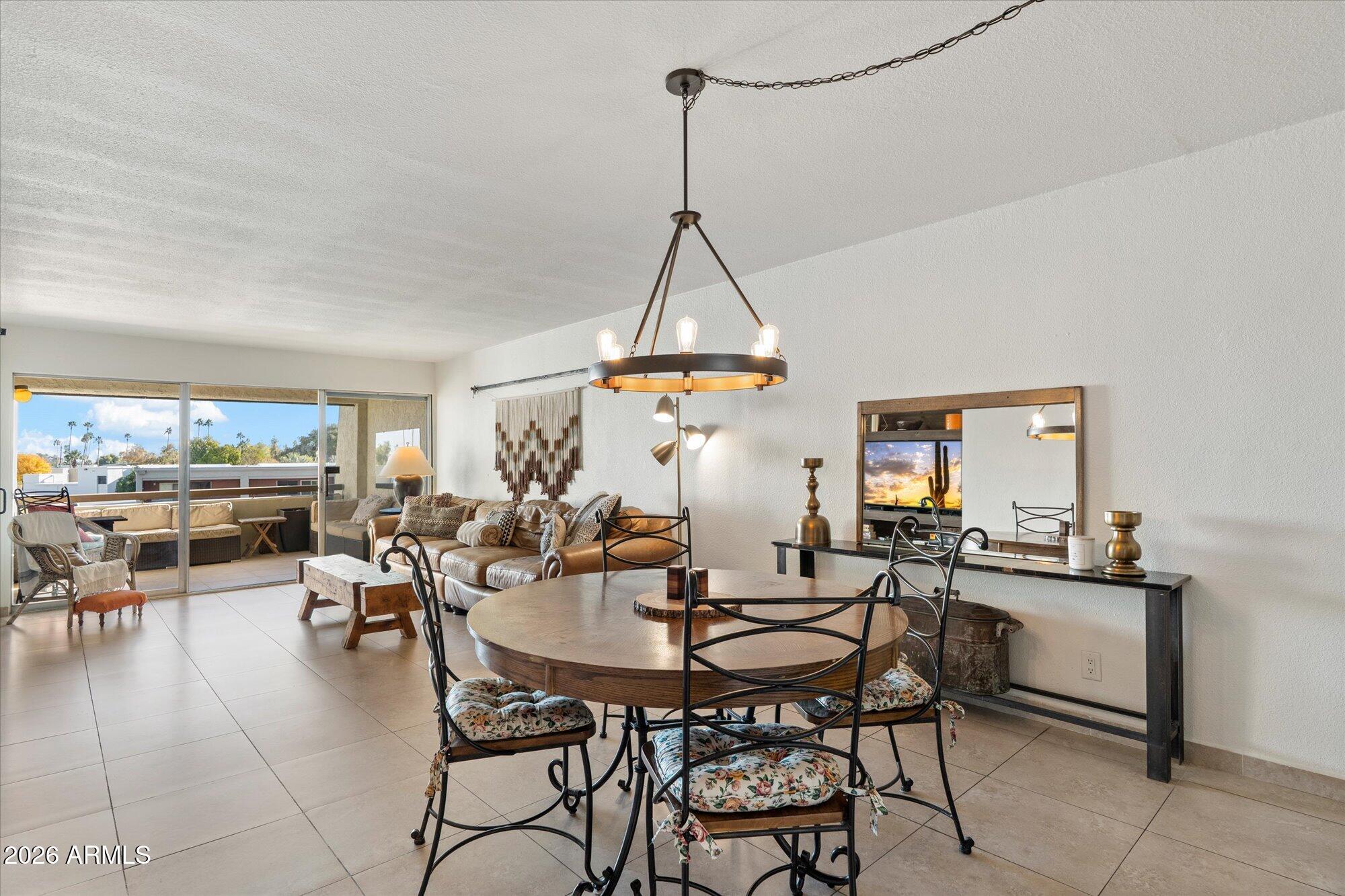 7625 East Camelback Road, Unit B325 Scottsdale, AZ 85251 - Photo 5 of 24 a view of a livingroom and dining room