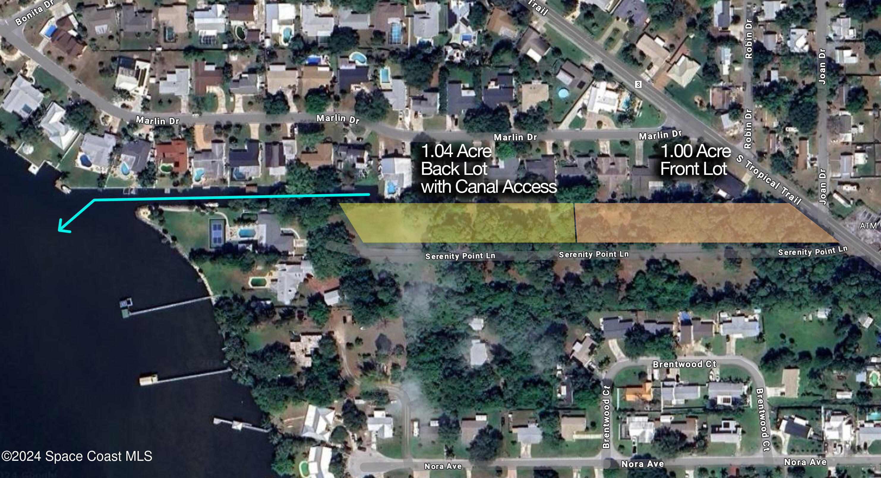 264 Serenity Point Lane Merritt Island, FL 32952 - Photo 4 of 12 a view of a swimming pool next to a building