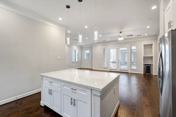 a view of a kitchen cabinets and a center island