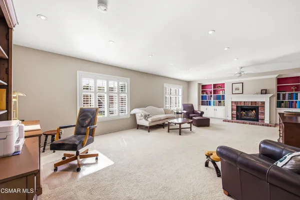 a living room with furniture and a couch