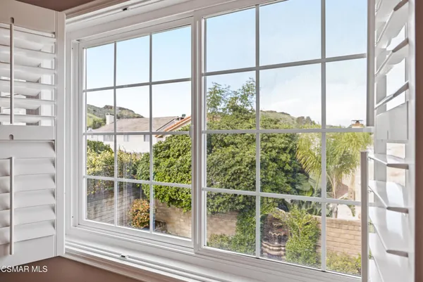 a view of a room with windows