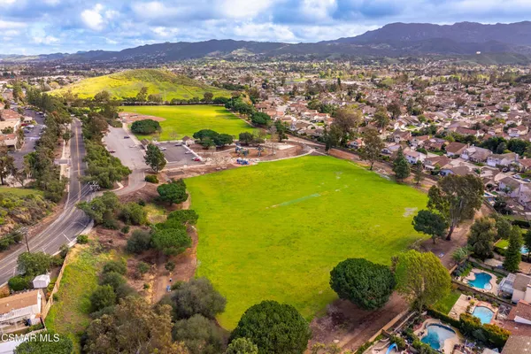 a view of a city with a lake