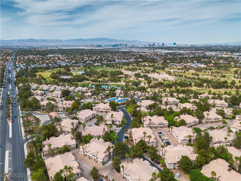 2050 West Warm Springs Road, Unit 1822 Henderson, NV 89014 - Photo 45 of 55 Drone / aerial view featuring a mountain view and a residential view