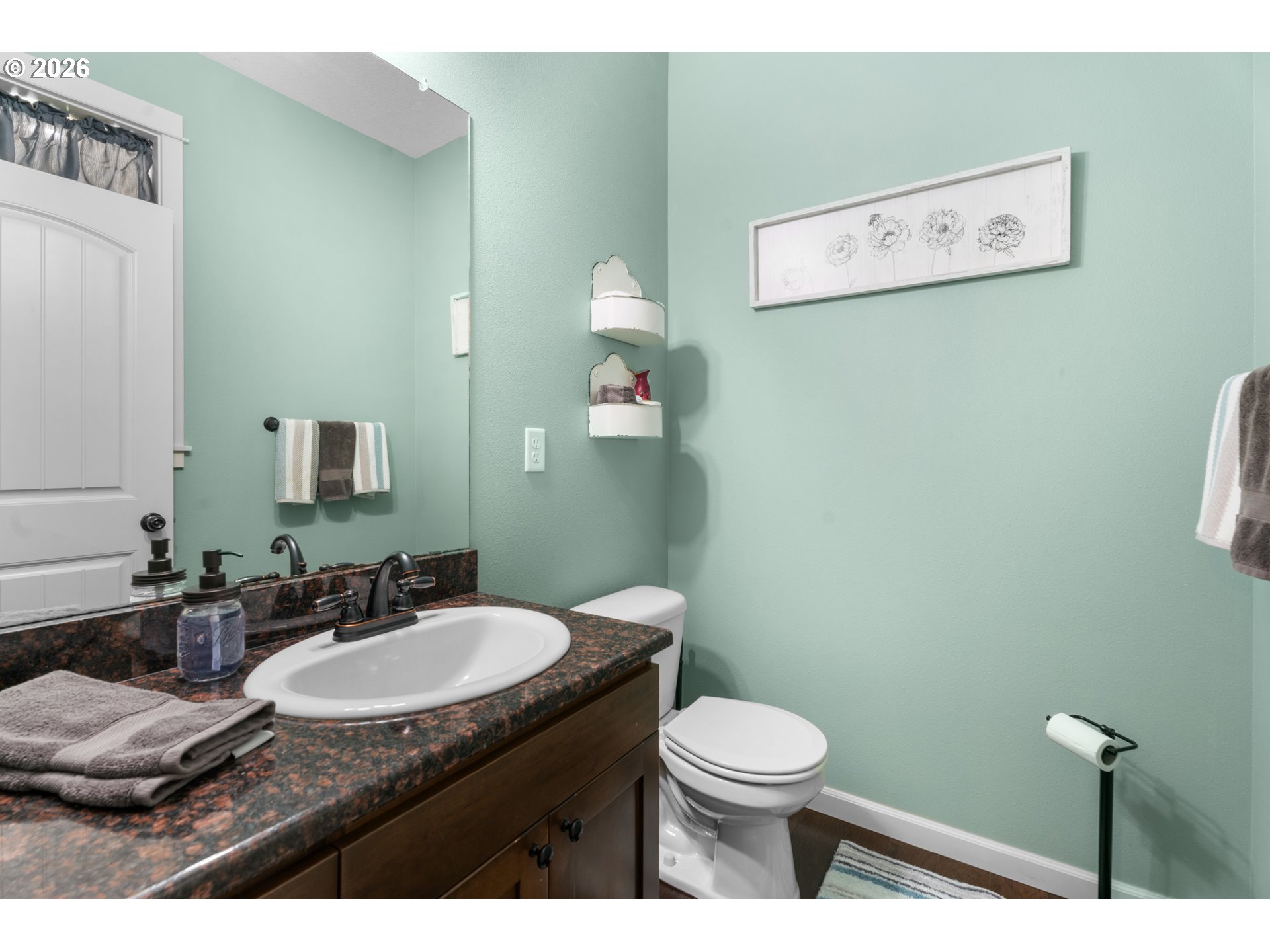 218 Finneys Avenue Molalla, OR 97038 - Photo 11 of 34 a bathroom with a granite countertop toilet sink and mirror