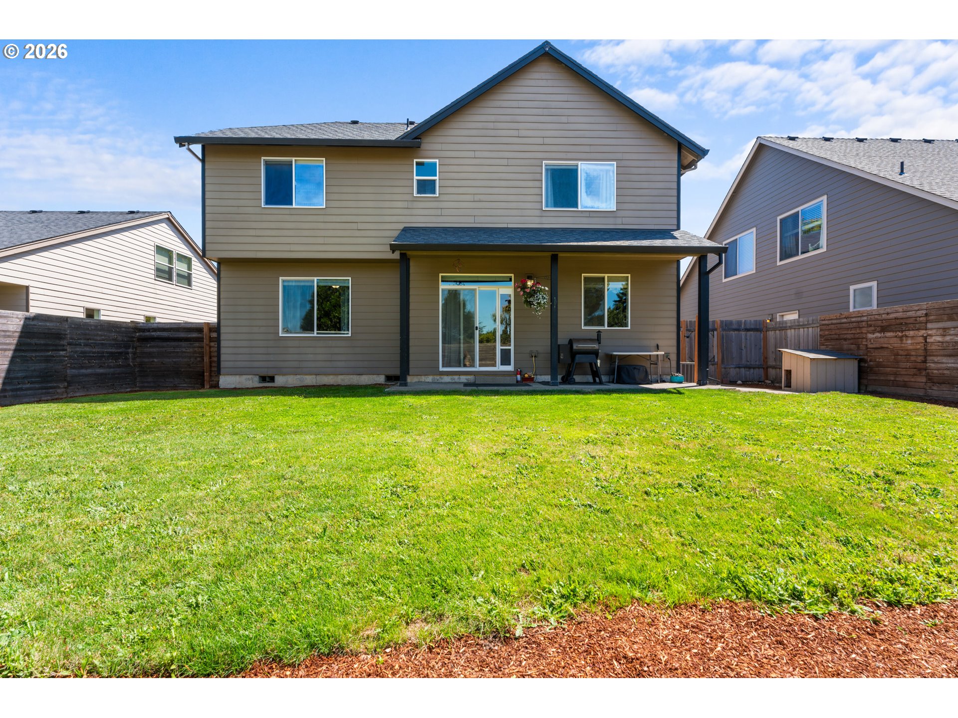 218 Finneys Avenue Molalla, OR 97038 - Photo 33 of 34 a view of a house with a yard