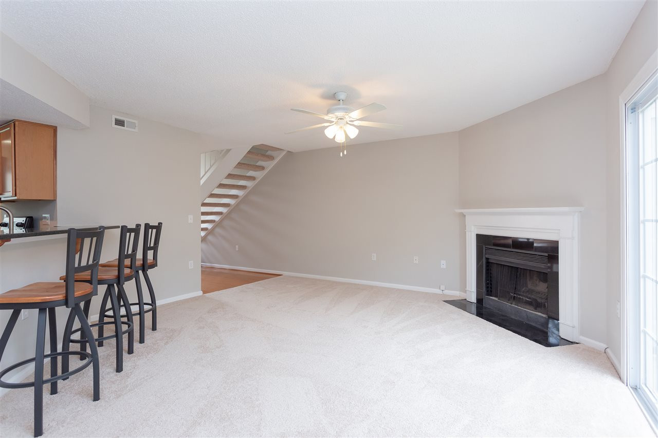 7812 Falcon Rest Circle Raleigh, NC 27615 - Photo 6 of 26 Family Room with Wood Burning Fireplace