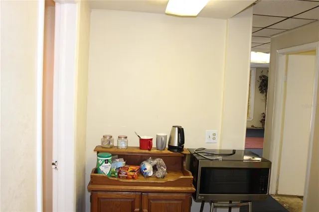 a view of a workspace with furniture