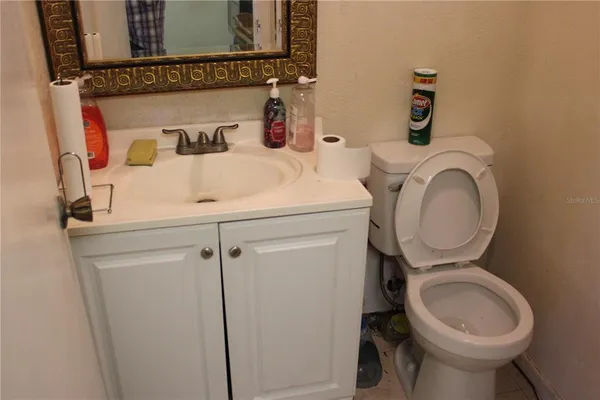a bathroom with a sink and a toilet