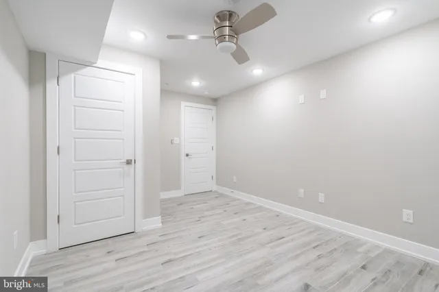 a view of entryway with wooden floor