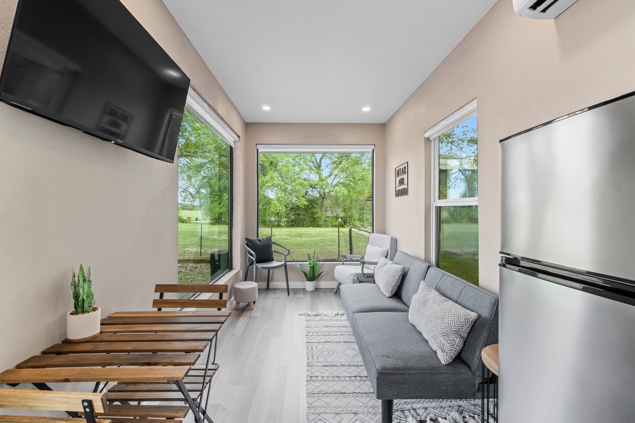 758 Jones Road New Waverly, TX 77358 - Photo 14 of 34 a living room with furniture and a large window