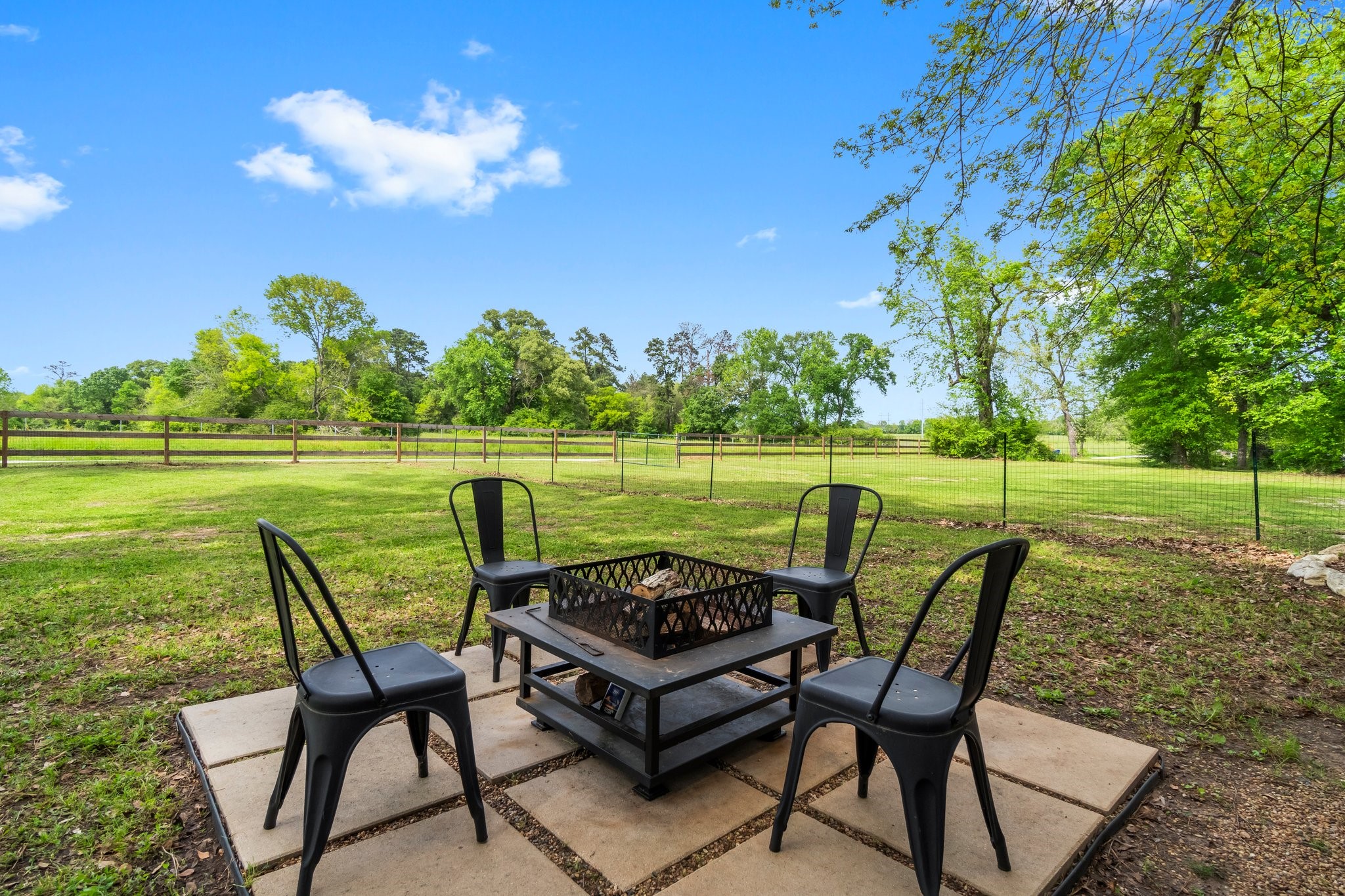 758 Jones Road New Waverly, TX 77358 - Photo 20 of 34 a view of a lake with table and chairs