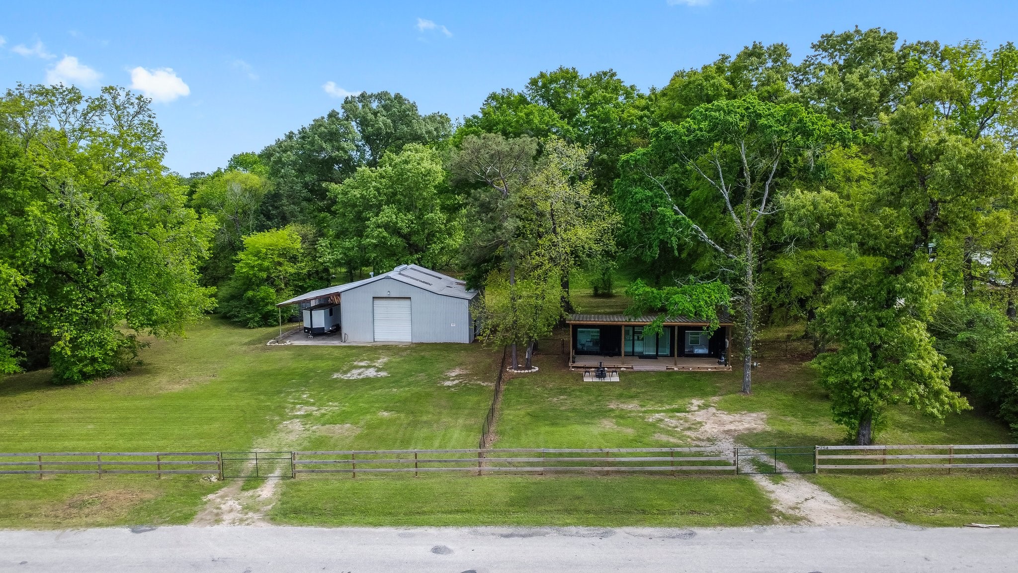 758 Jones Road New Waverly, TX 77358 - Photo 28 of 34 a view of a house with a big yard