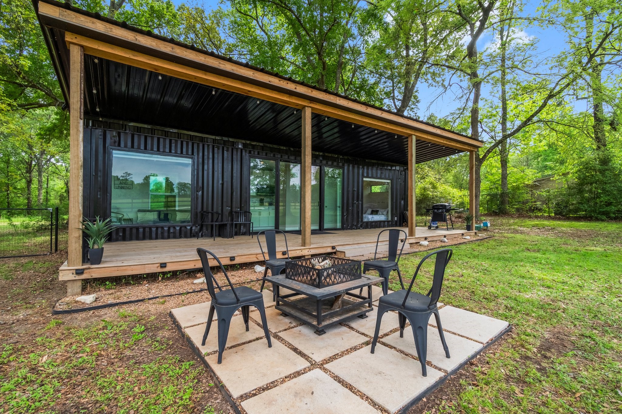 758 Jones Road New Waverly, TX 77358 - Photo 5 of 34 a backyard of a house with table and chairs