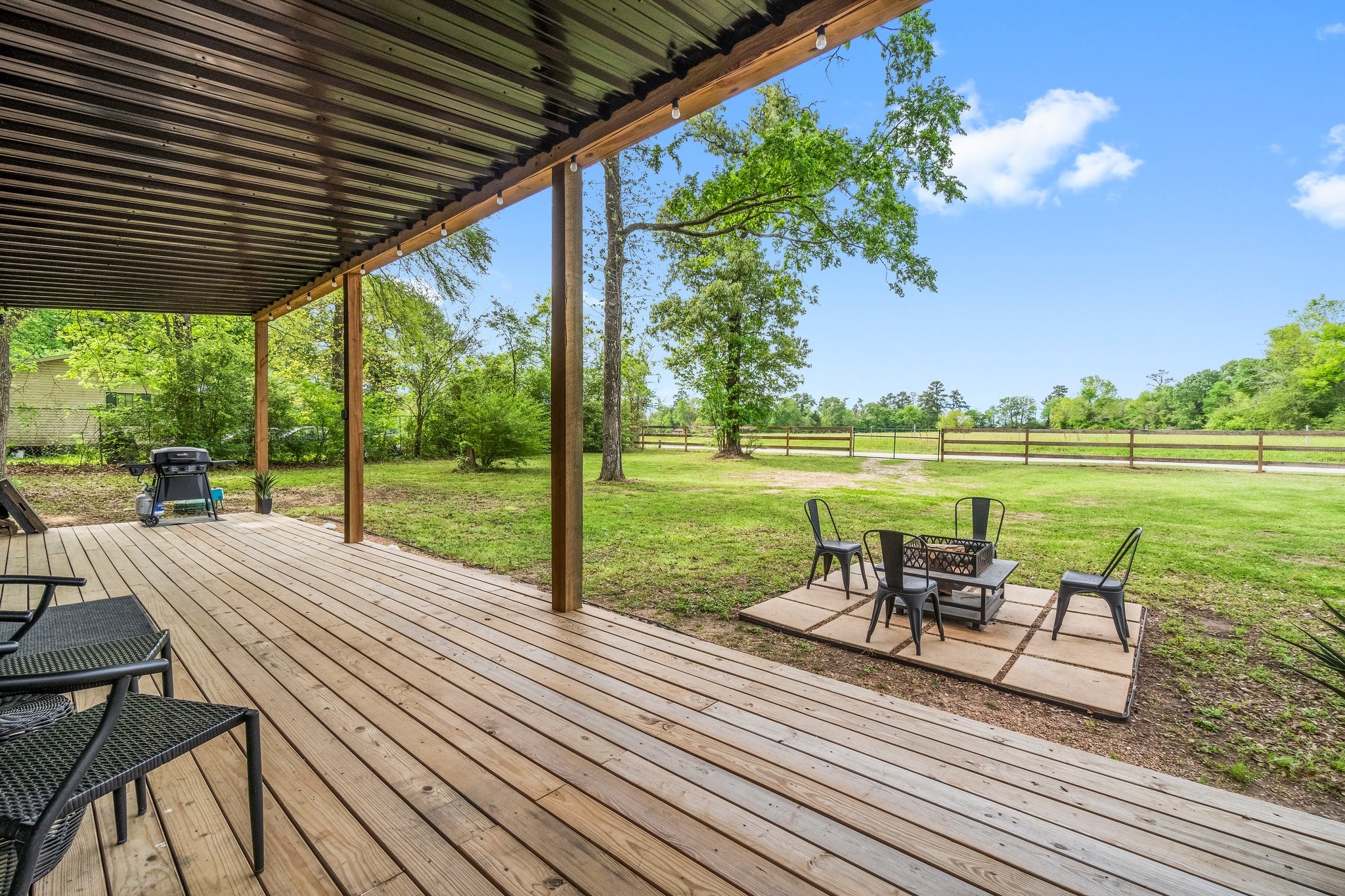 758 Jones Road New Waverly, TX 77358 - Photo 7 of 34 a view of a swimming pool with a patio