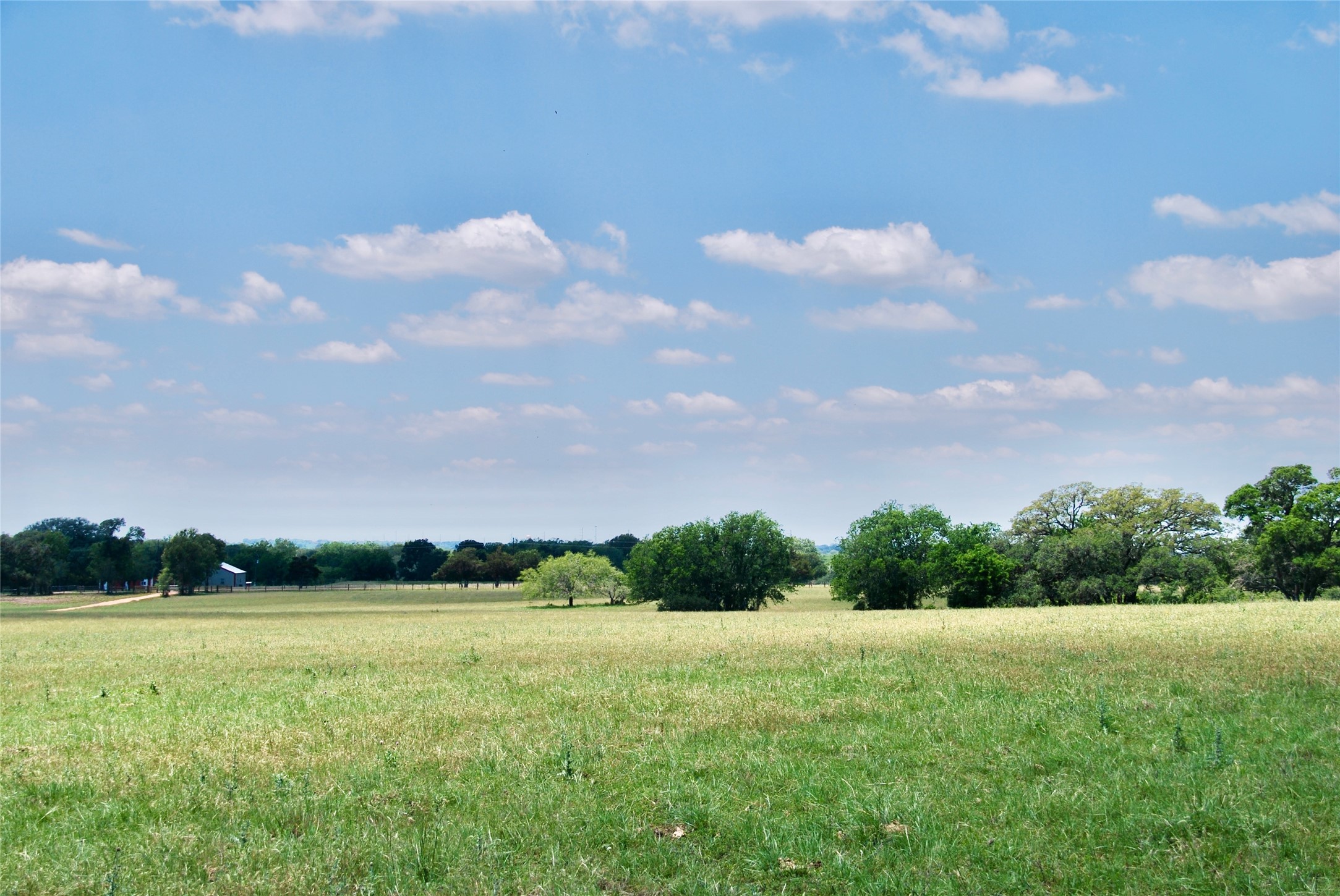 2116 Langdon Road Weimar, TX 78962 - Photo 2 of 43 a view of a lake and mountain in the back