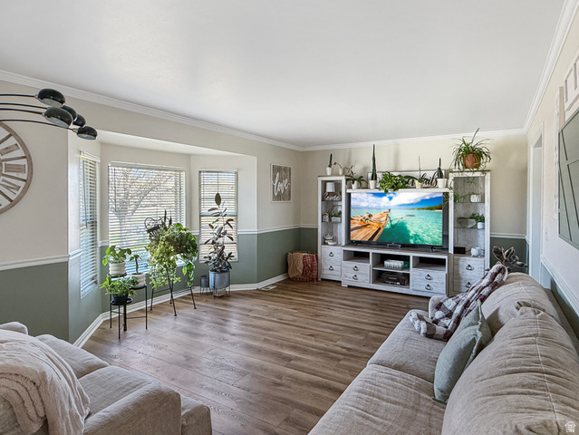 1716 Sagewood Road Price, UT 84501 - Photo 4 of 73 Living room with dark wood finished floors and ornamental molding