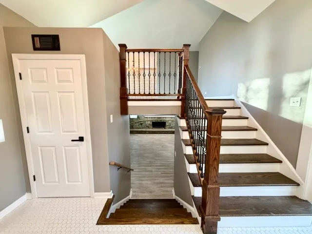 a view of entryway with wooden floor