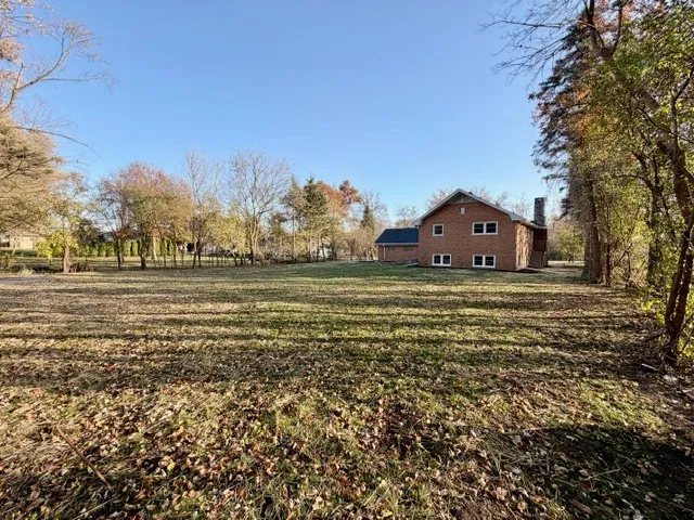 a view of a large body of water with a building in the background