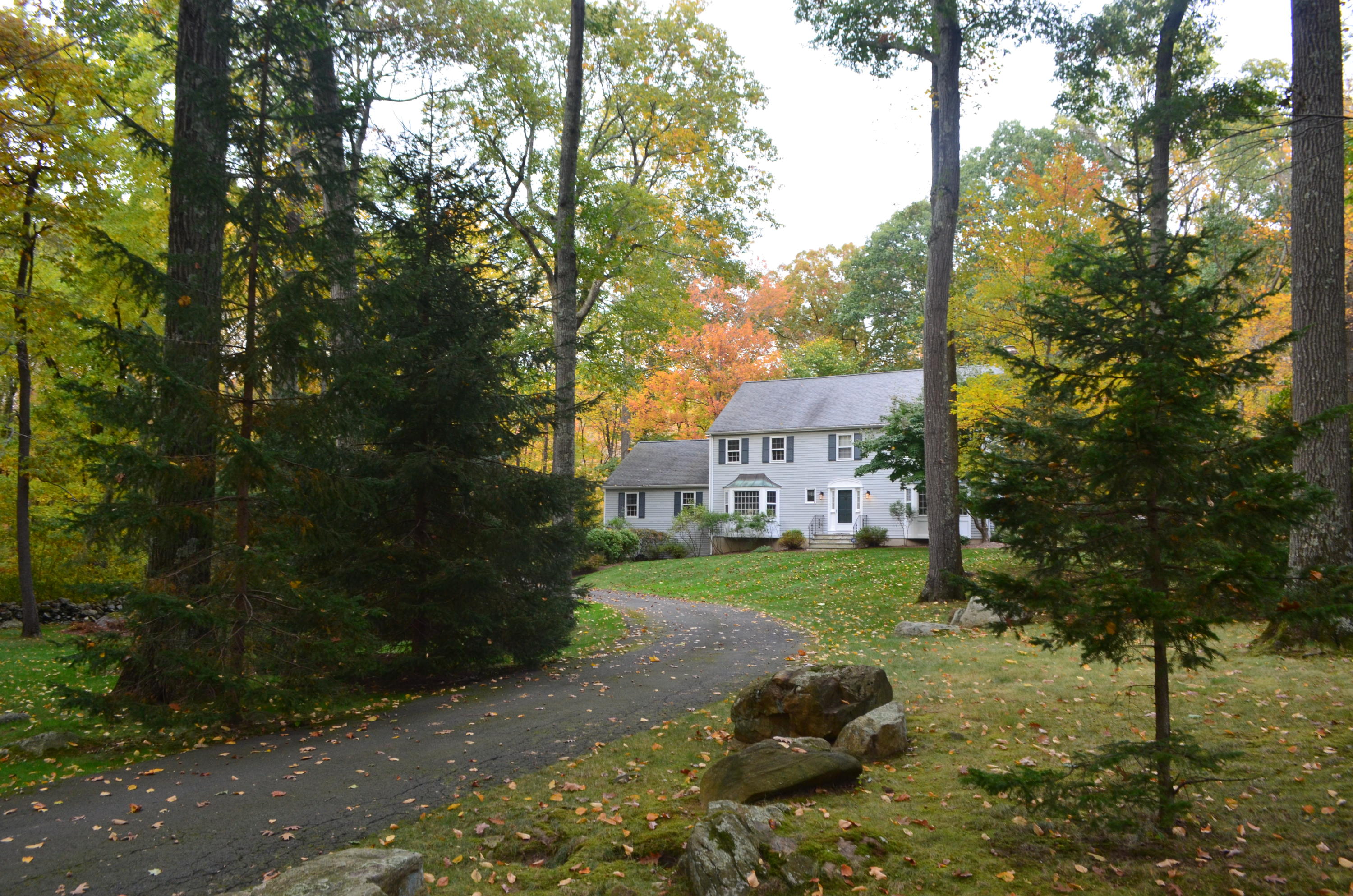 30 Mayapple Road Wilton, CT 06897 - Photo 24 of 24 a view of a house with a yard