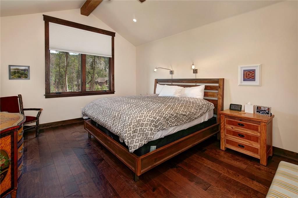 767 Independence Road, Unit 3A Keystone, CO 80435 - Photo 12 of 35 a bed sitting in a bedroom next to a window