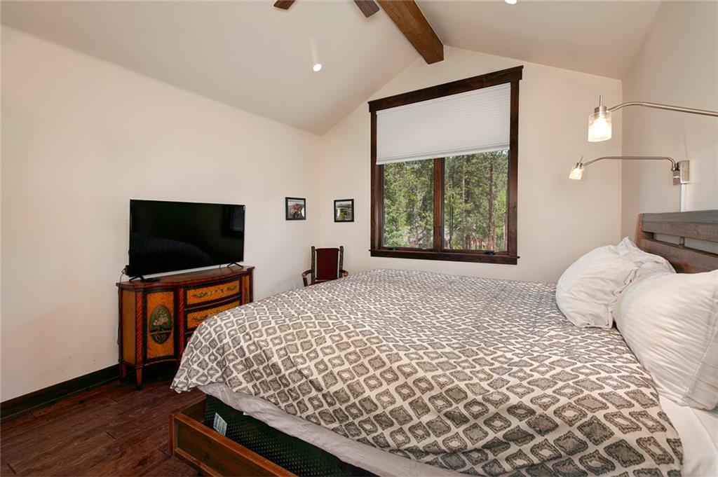 767 Independence Road, Unit 3A Keystone, CO 80435 - Photo 14 of 35 a bedroom with a bed and a flat screen tv