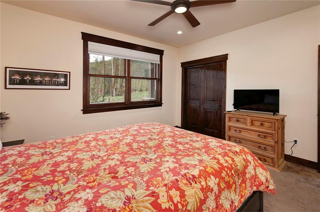 767 Independence Road, Unit 3A Keystone, CO 80435 - Photo 18 of 35 a bedroom with a bed and a flat screen tv