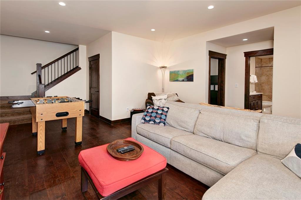 767 Independence Road, Unit 3A Keystone, CO 80435 - Photo 23 of 35 a living room with furniture and wooden floor