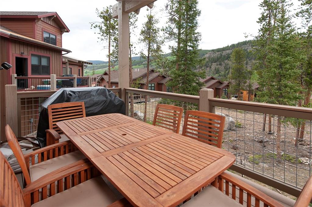 767 Independence Road, Unit 3A Keystone, CO 80435 - Photo 27 of 35 a view of a balcony with wooden floor and outdoor seating