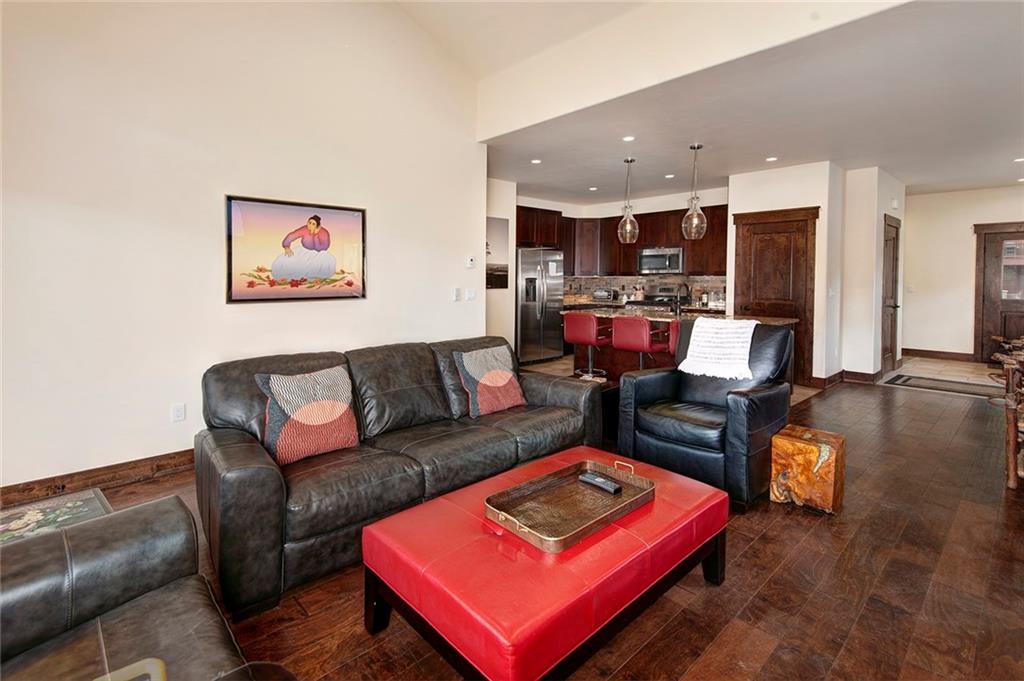 767 Independence Road, Unit 3A Keystone, CO 80435 - Photo 7 of 35 a living room with furniture and kitchen view
