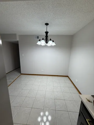 a view of balcony with furniture