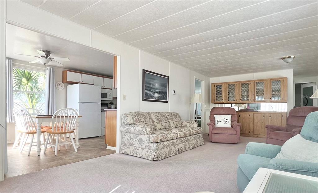 1100 South Belcher Road, Unit 23 Largo, FL 33771 - Photo 19 of 87 a living room with furniture and a large window