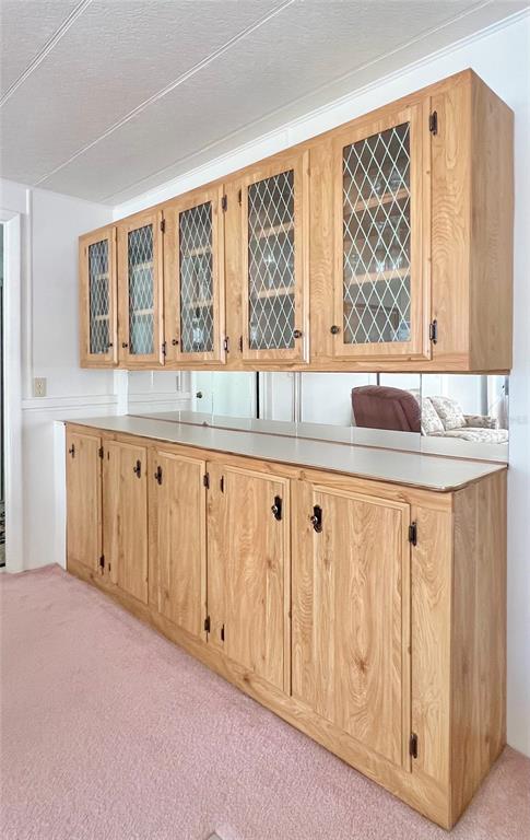 1100 South Belcher Road, Unit 23 Largo, FL 33771 - Photo 22 of 87 a bathroom with a granite countertop sink and a large mirror