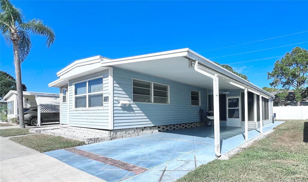 1100 South Belcher Road, Unit 23 Largo, FL 33771 - Photo 5 of 87 a front view of a house