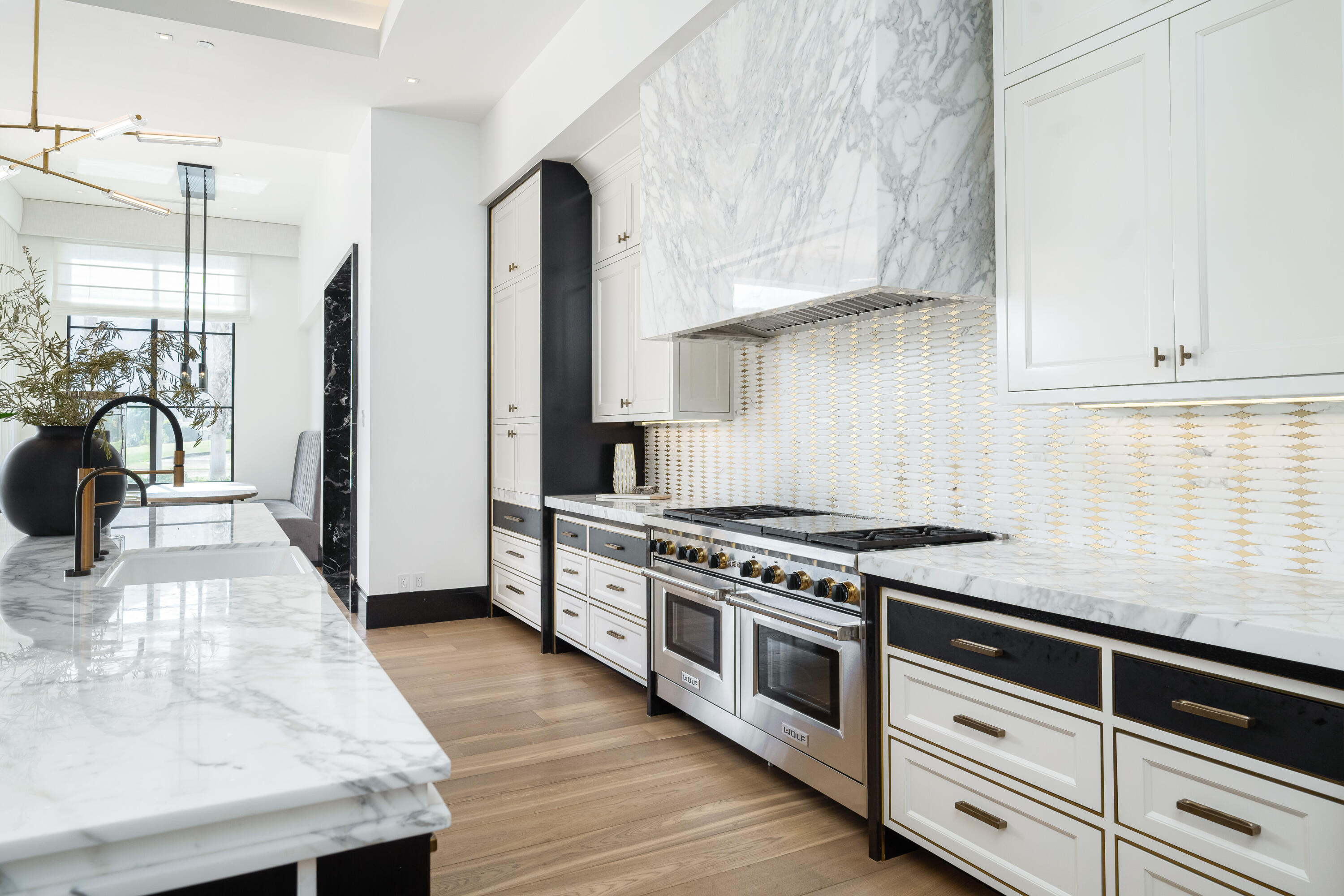 53747 Via Strada La Quinta, CA 92253 - Photo 16 of 59 a kitchen with stainless steel appliances granite countertop a stove and a white cabinets