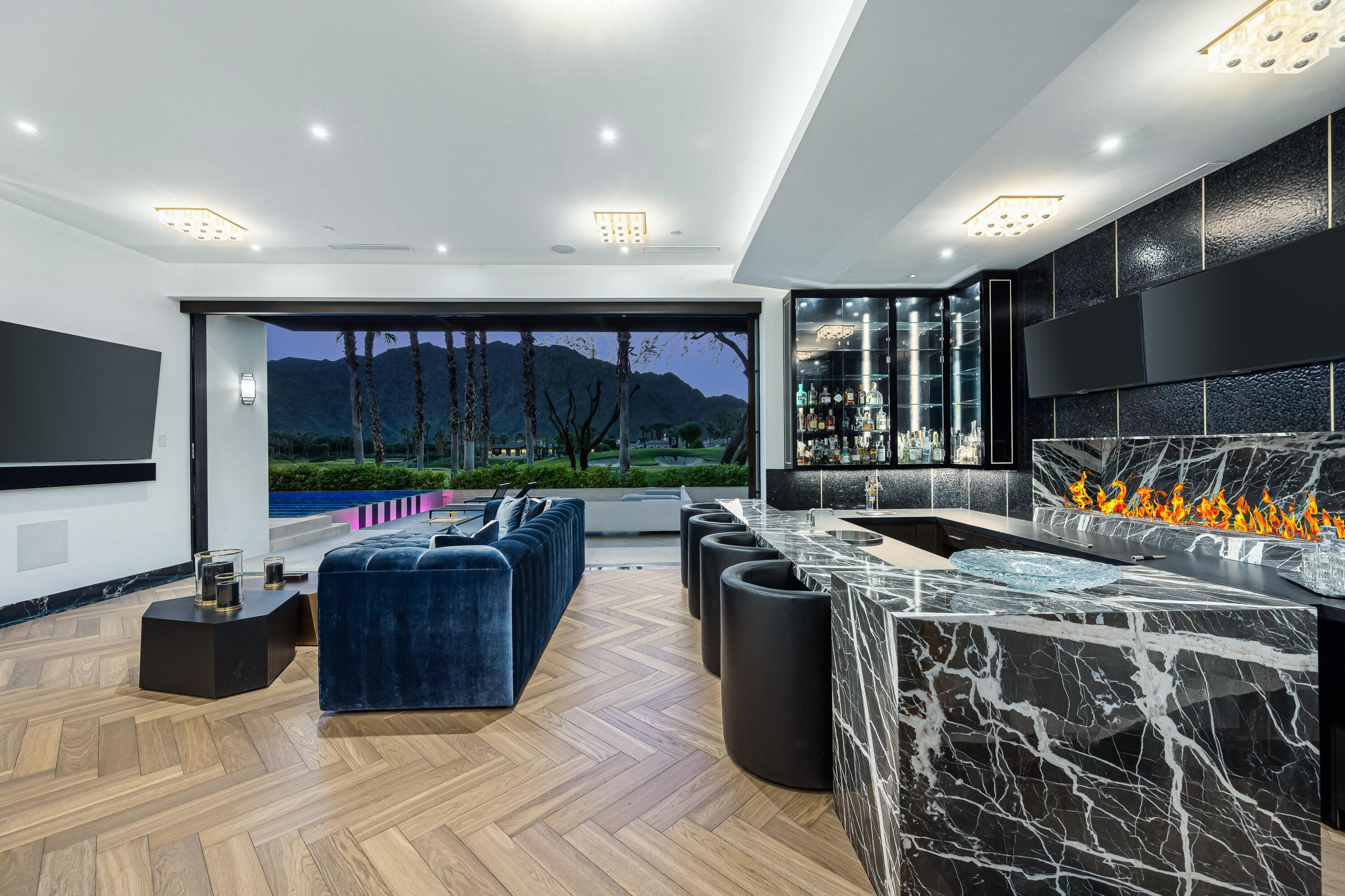 53747 Via Strada La Quinta, CA 92253 - Photo 21 of 59 a view of a living room and a flat screen tv