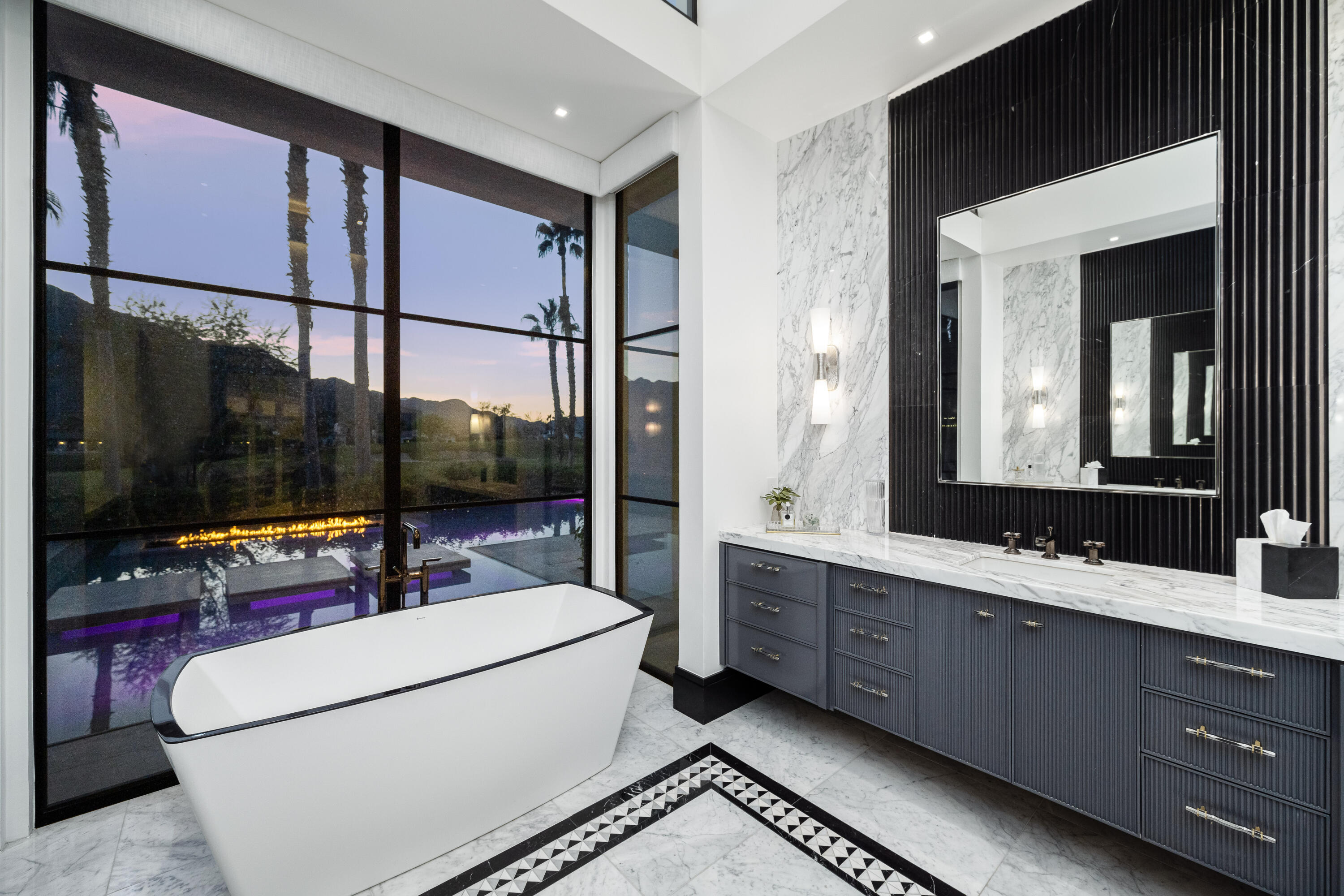 53747 Via Strada La Quinta, CA 92253 - Photo 30 of 59 a living room with a large window and furniture