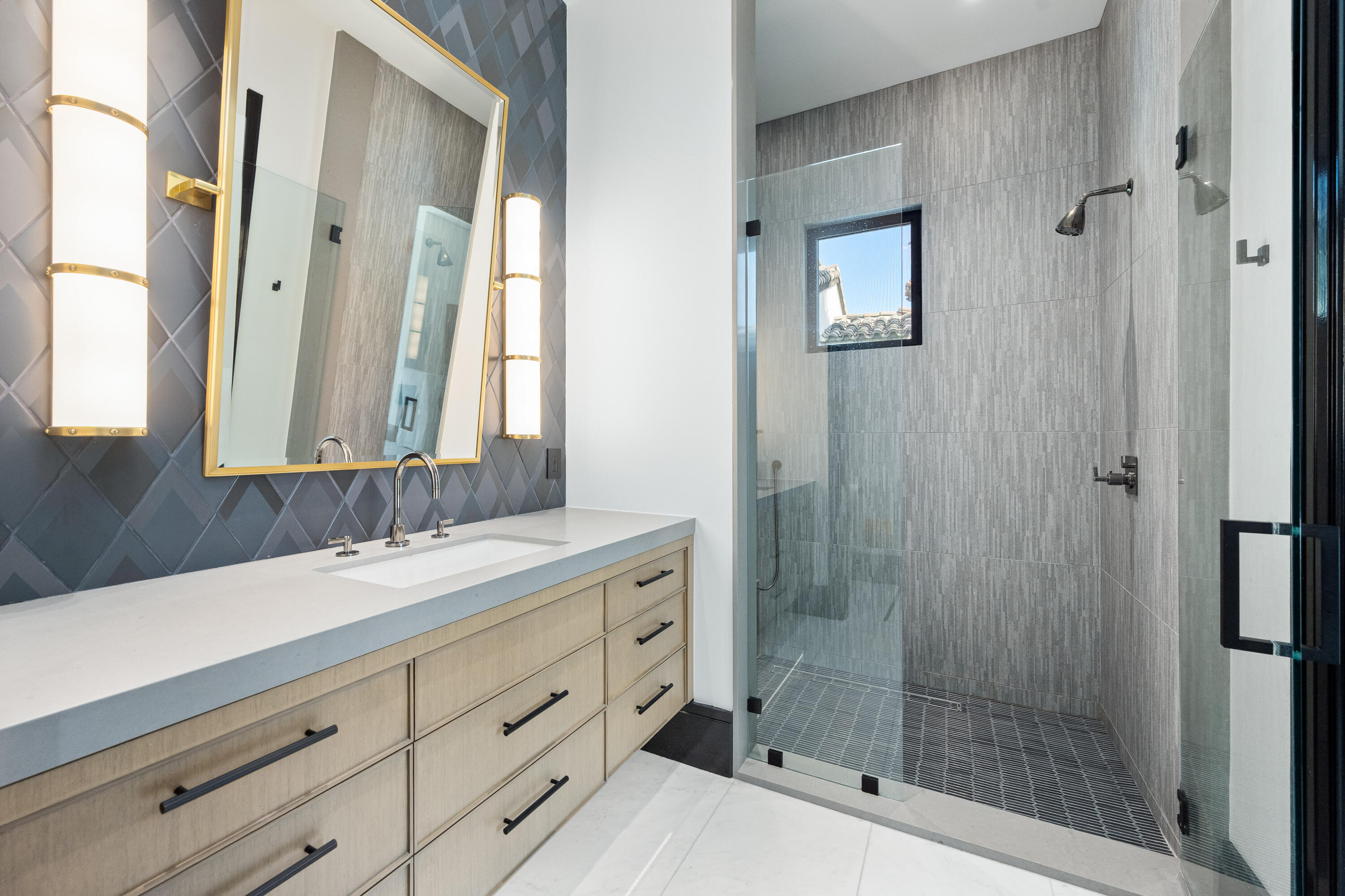 53747 Via Strada La Quinta, CA 92253 - Photo 35 of 59 a bathroom with a double vanity sink mirror and shower