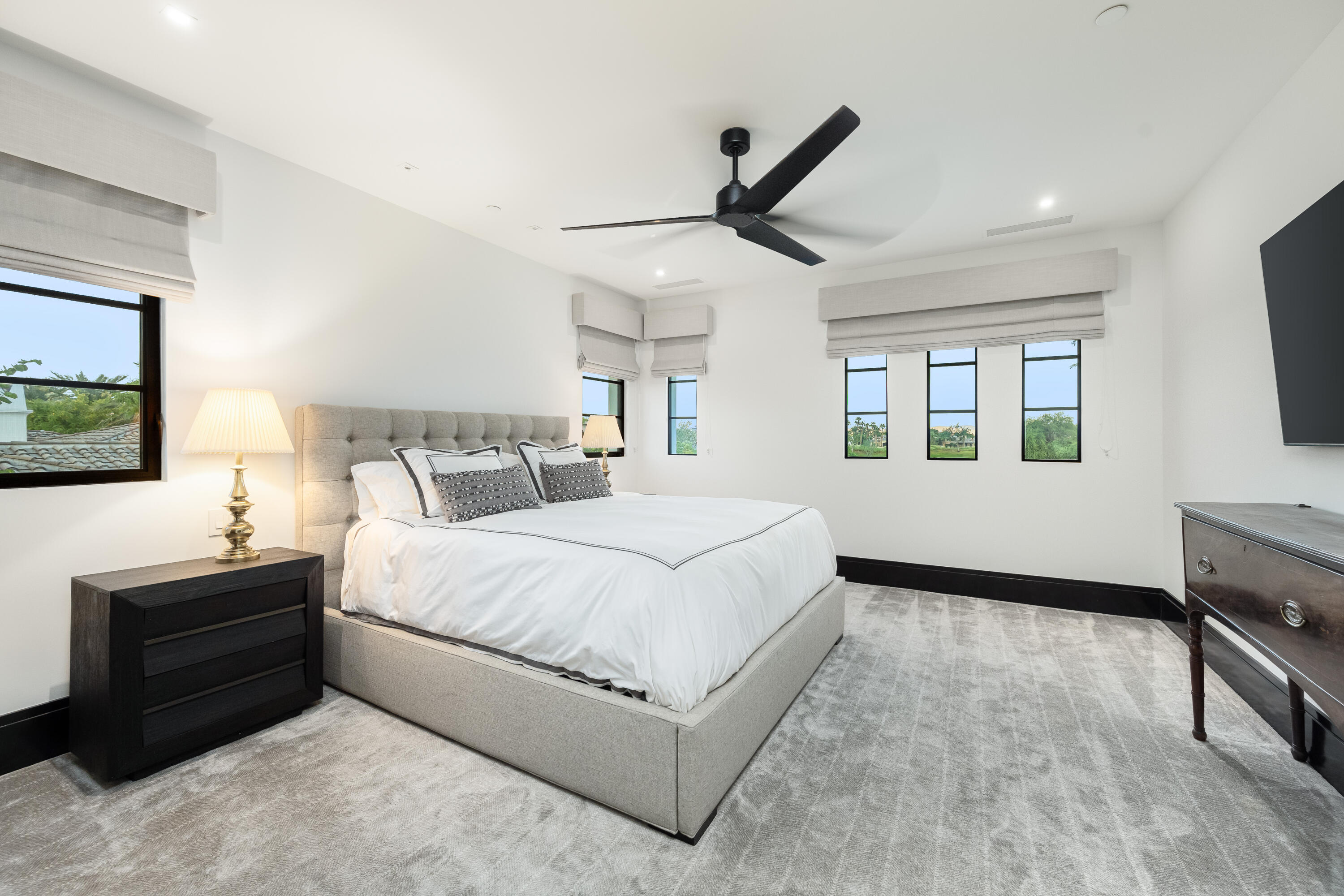 53747 Via Strada La Quinta, CA 92253 - Photo 38 of 59 a bedroom with a large bed and a flat tv screen on dresser