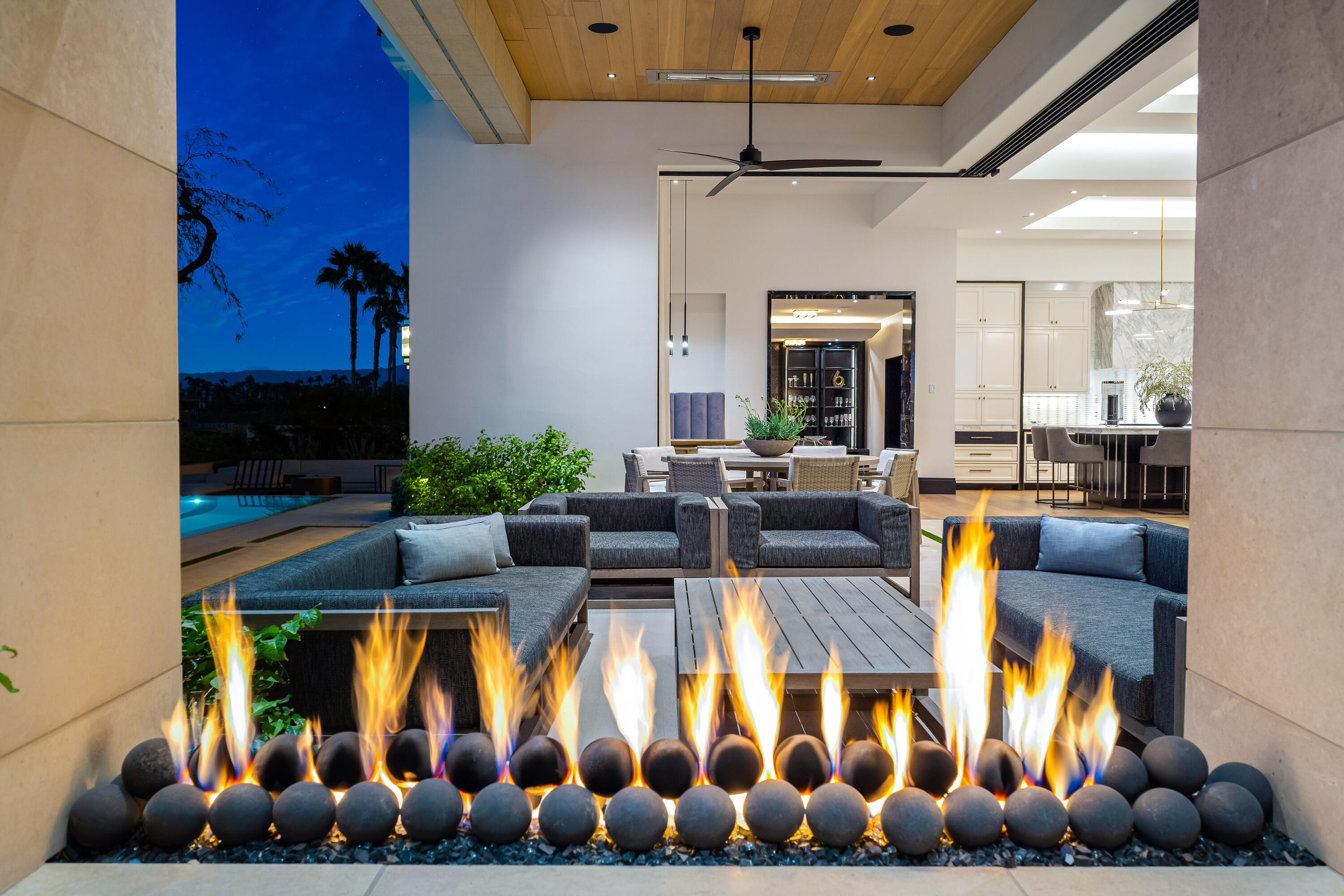 53747 Via Strada La Quinta, CA 92253 - Photo 48 of 59 a living room with furniture fireplace and chandelier