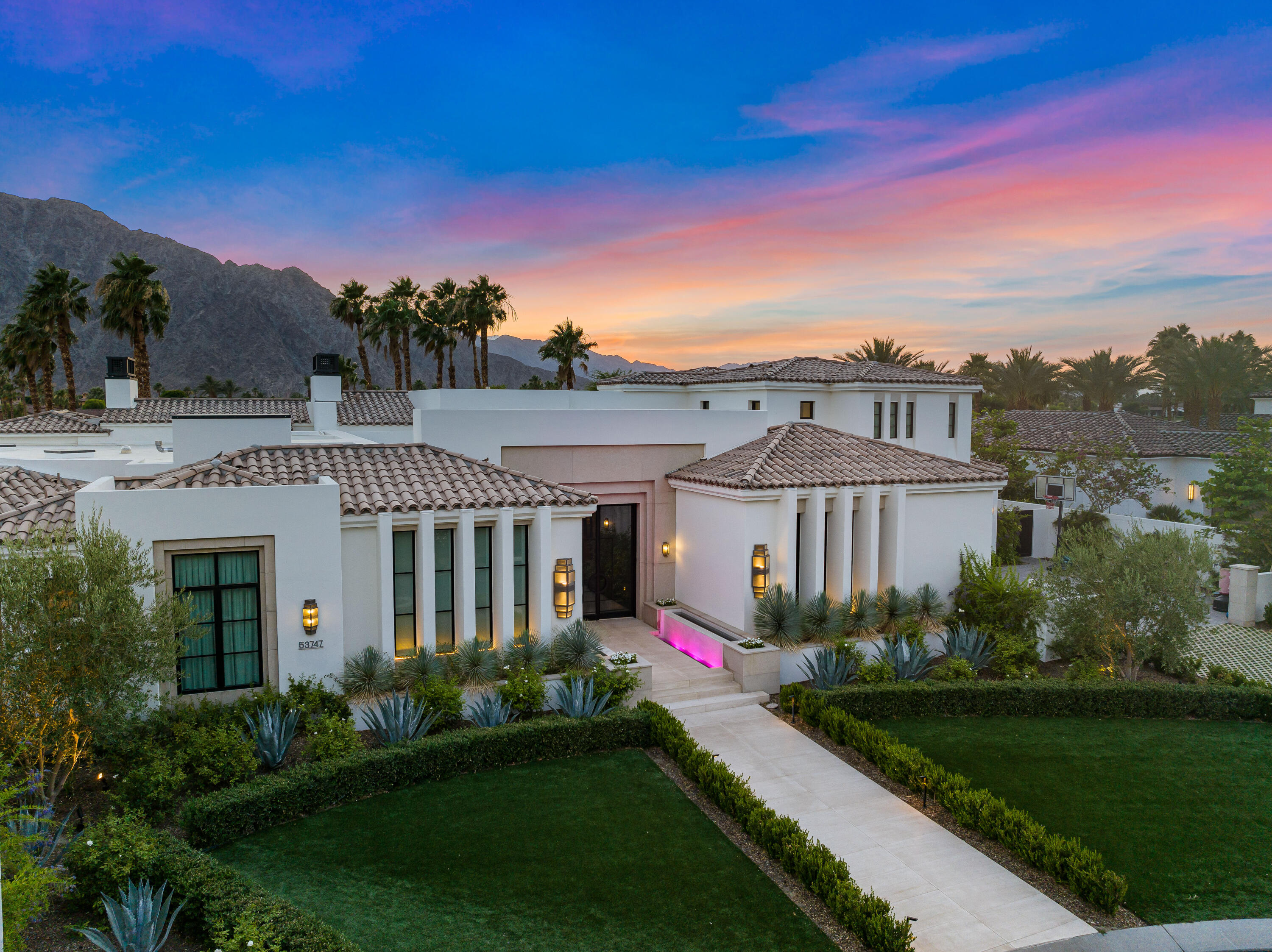 53747 Via Strada La Quinta, CA 92253 - Photo 57 of 59 front view of a house with a yard